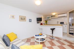 Kuchyň nebo kuchyňský kout v ubytování Apartments Simović