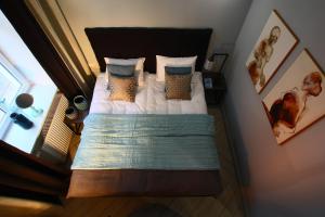 Posteľ alebo postele v izbe v ubytovaní Apartamenty Batorego 2 - Stary Rynek