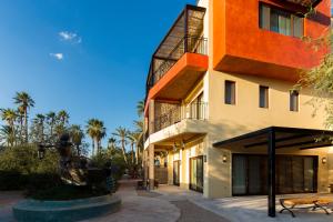 a building with a statue in front of a building at Marea La Paz in La Paz