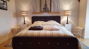 Giường trong phòng chung tại L'Horizon Holiday Apartment