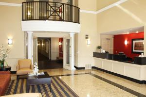 a lobby of a hotel with a couch and a chandelier at Extended Stay America Suites - Portland - Hillsboro in Hillsboro