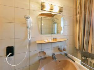 Koupelna v ubytování Hotel Alpina + 37 fotografií