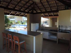 Η κουζίνα ή μικρή κουζίνα στο Verano Residencial C01