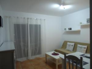A seating area at Apartamento Céntrico Lobos