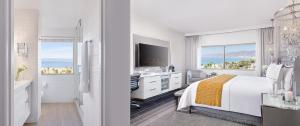a hotel room with a bed and a television at Huntley Santa Monica Beach in Los Angeles