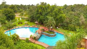 an overhead view of a pool at a resort at Hotel Carmen in Puerto Iguazú