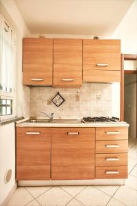 مطبخ أو مطبخ صغير في Casa Mare Blu codice CITRA OO9O34 LT 1168