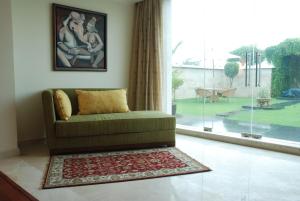 A seating area at The Lalit Temple View