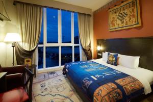 Letto o letti in una camera di Legoland Malaysia Hotel