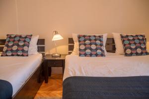 Letto o letti in una camera di Selection Rooms
