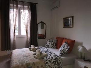 Posteľ alebo postele v izbe v ubytovaní Apartment KAPO