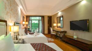 TV a/nebo společenská místnost v ubytování Country Garden Phoenix Hotel Huizhou Huiyang