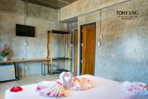 Postel nebo postele na pokoji v ubytování Ton Fang Hotel + 23 fotografií