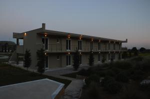 a large building with lights on the side of it at Marathon Eco Stay in Marathon