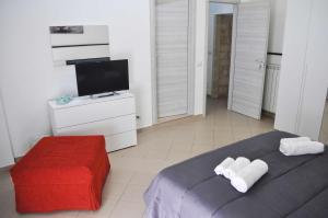 A bed or beds in a room at ragusa curtigghiu