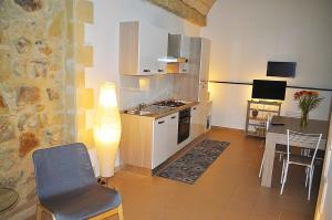 A kitchen or kitchenette at ragusa curtigghiu