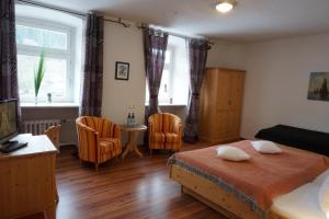 Postel nebo postele na pokoji v ubytování Hotel Klosterhof