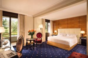 Voodi või voodid majutusasutuse Hotel Splendide Royal toas