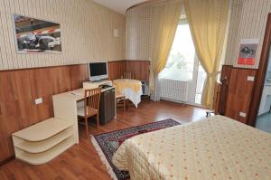Postel nebo postele na pokoji v ubytování Hotel Fossati + 28 fotografií