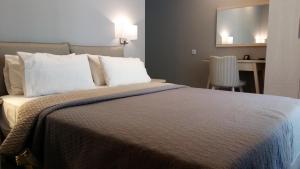 Katil atau katil-katil dalam bilik di Il Mondo Residence