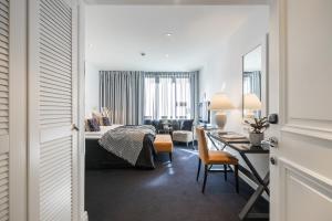 Ένα ή περισσότερα κρεβάτια σε δωμάτιο στο Hotel Fabian