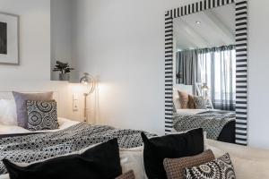 Ένα ή περισσότερα κρεβάτια σε δωμάτιο στο Hotel Fabian