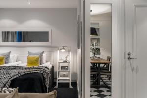 Ένα ή περισσότερα κρεβάτια σε δωμάτιο στο Hotel Fabian