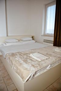 Кровать или кровати в номере Domus Damar