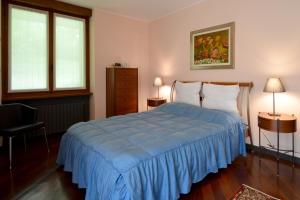 Postel nebo postele na pokoji v ubytování Villa Onorina