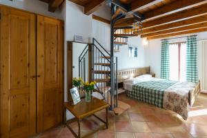Postel nebo postele na pokoji v ubytování Agriturismo Giacomino + 37 fotografií