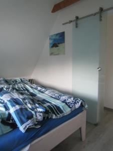 Postel nebo postele na pokoji v ubytování Kiekin-Kiekut