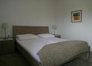 Postel nebo postele na pokoji v ubytování Landhaus Tauber