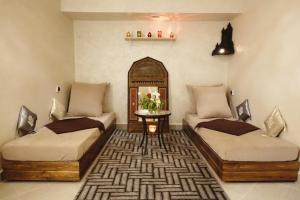 Posezení v ubytování Aparthotel Les Oliviers Suites & Spa