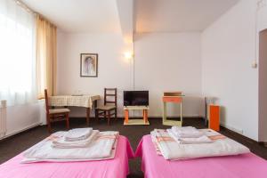 Postel nebo postele na pokoji v ubytování Hostel Horia + 31 fotografií