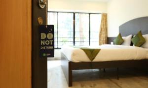 Postel nebo postele na pokoji v ubytování Itsy Hotels Hill View Ex