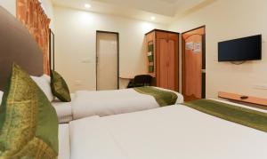 Postel nebo postele na pokoji v ubytování Itsy Hotels Hill View Ex