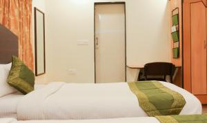 Postel nebo postele na pokoji v ubytování Itsy Hotels Hill View Ex