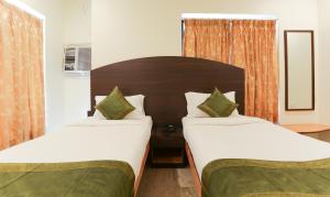 Postel nebo postele na pokoji v ubytování Itsy Hotels Hill View Ex