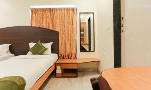 Postel nebo postele na pokoji v ubytování Itsy Hotels Hill View Ex