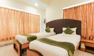 Postel nebo postele na pokoji v ubytování Itsy Hotels Hill View Ex