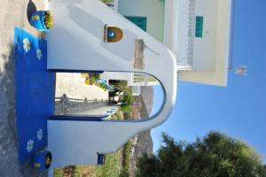 a mirror image of a ride in a roller coaster at Pension Titika in Katapola