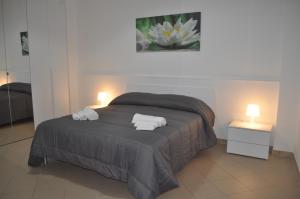 A bed or beds in a room at ragusa curtigghiu