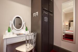 Letto o letti in una camera di Grand Hôtel Amelot
