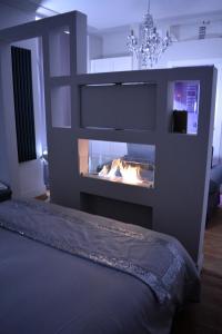 A bed or beds in a room at b&b dolce casa con Sauna e cromoterapia