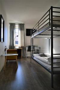 Postel nebo postele na pokoji v ubytování Solsta Hotell