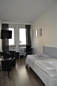 Postel nebo postele na pokoji v ubytování Solsta Hotell