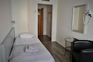 Postel nebo postele na pokoji v ubytování Solsta Hotell