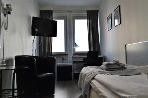 Postel nebo postele na pokoji v ubytování Solsta Hotell