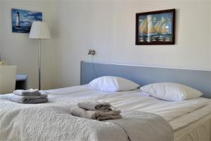 Postel nebo postele na pokoji v ubytování Solsta Hotell