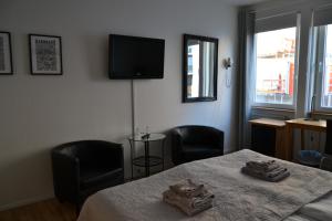Postel nebo postele na pokoji v ubytování Solsta Hotell